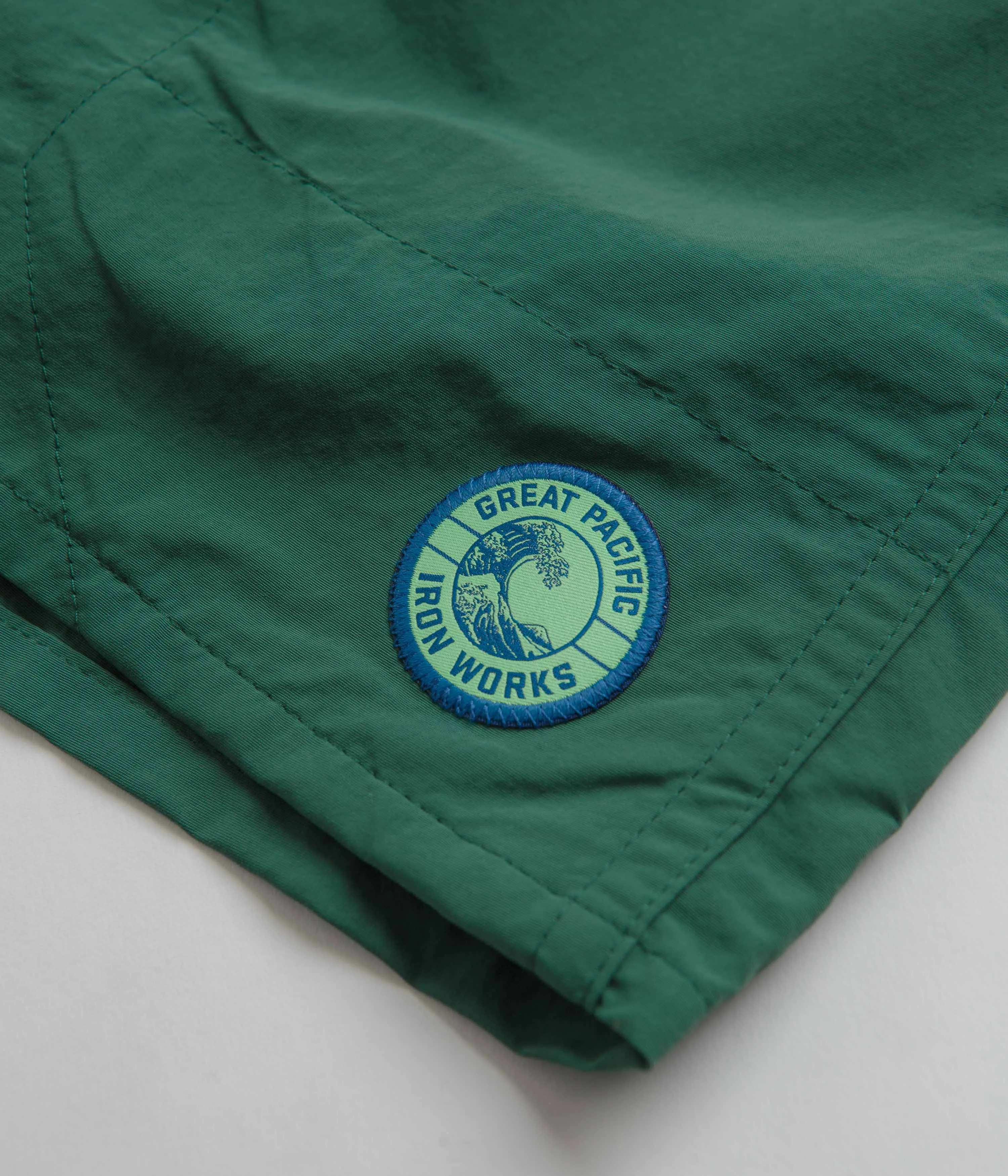 Patagonia Baggies Longs 7 Shorts - GPIW Crest: Conifer Green